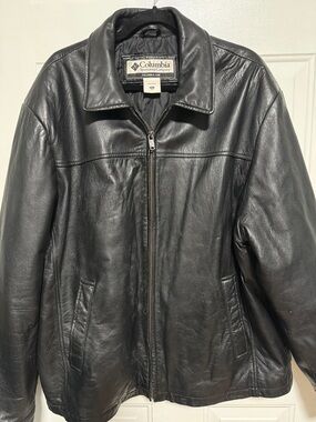 Columbia Black Leather Bomber Jacket distressed with wear